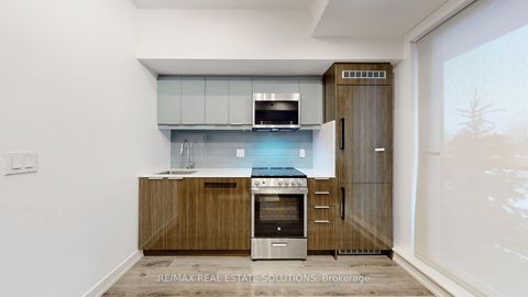 Photo 1 at 407 - 90 Glen Everest Road, Cliffside, Toronto