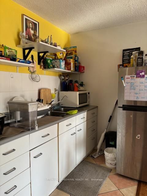 Photo 15 at 14 - 23 Four Winds Drive, York University Heights, Toronto