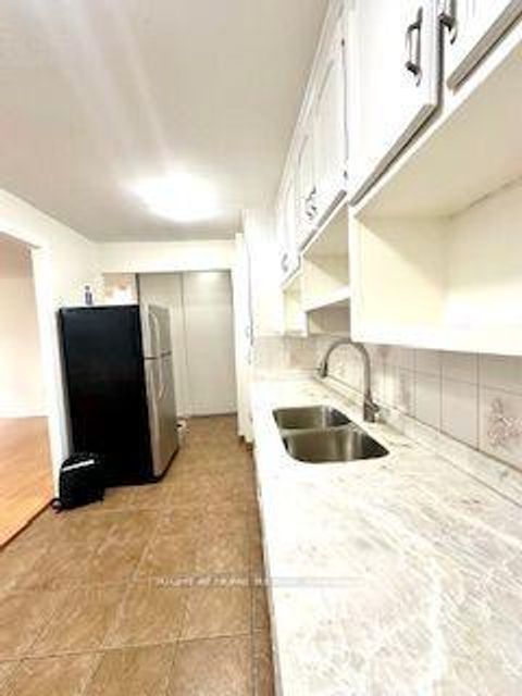 Photo 11 at 211 - 335 Driftwood Avenue, Black Creek, Toronto