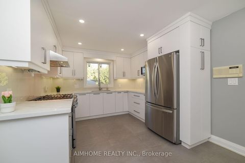 Photo 14 at 28 Longbow Square, Steeles, Toronto