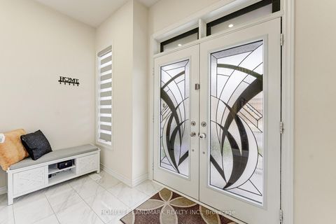 Photo 3 at 49 Ogston Crescent, Rural Whitby, Whitby