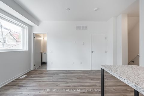 Photo 6 at TH8 - 20 Ed Clark Gardens, Pellam Park, Toronto