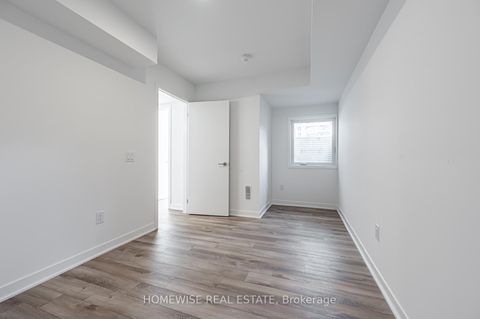 Photo 8 at TH8 - 20 Ed Clark Gardens, Pellam Park, Toronto