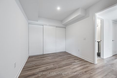 Photo 10 at TH8 - 20 Ed Clark Gardens, Pellam Park, Toronto