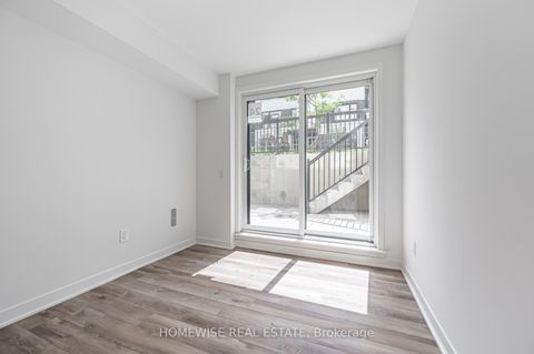 Photo 12 at TH8 - 20 Ed Clark Gardens, Pellam Park, Toronto