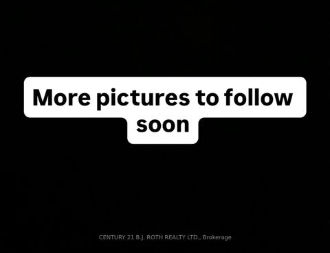 Photo 2 at 50 Buttonwood Trail, Aurora Highlands, Aurora