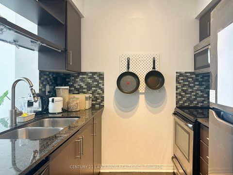 Photo 3 at Ph 7 - 30 Heron's Hill Way, Henry Farm, Toronto