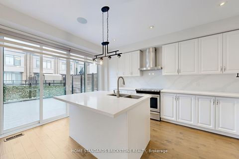 Photo 9 at 215 Salterton Circle, Rural Vaughan, Vaughan