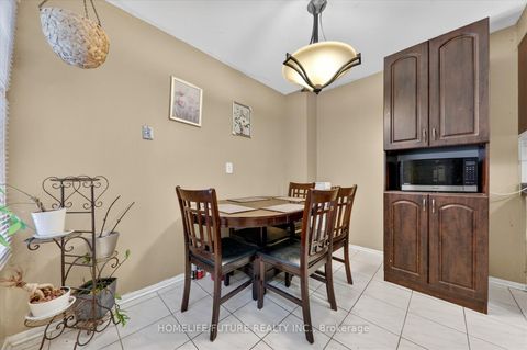 Photo 7 at 61 Warwick Castle Court, Malvern, Toronto