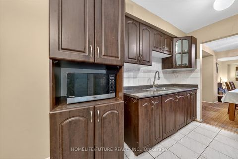 Photo 9 at 61 Warwick Castle Court, Malvern, Toronto