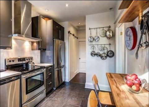 Photo 9 at 13 Sutherland Avenue, Crescent Town, Toronto