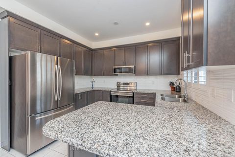 Photo 11 at 99 Huguenot Road, GO Glenorchy, Oakville