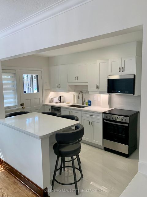 Photo 1 at 420 Jane Street, Lambton Baby Point, Toronto