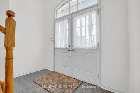 Photo 4 at 48 Thistlewaite Crescent, Malvern West, Toronto