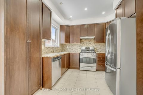 Photo 8 at 48 Thistlewaite Crescent, Malvern West, Toronto