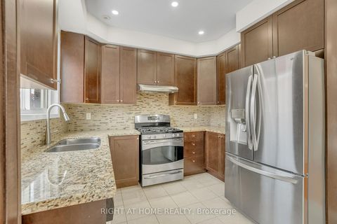 Photo 9 at 48 Thistlewaite Crescent, Malvern West, Toronto