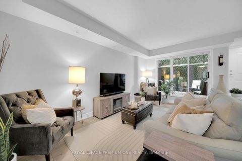 Photo 1 at 13 - 66 Long Branch Avenue, Long Branch, Toronto