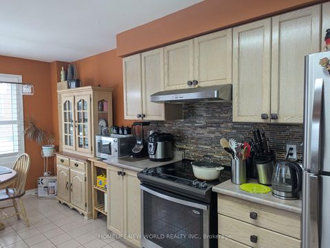 Photo 7 at 138 - 83 Mondeo Drive, Dorset Park, Toronto