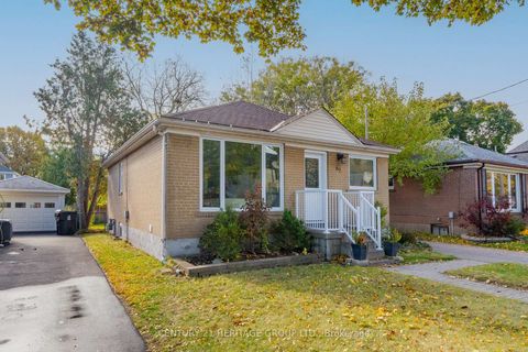 Photo 1 at 67 Savona Drive, Alderwood, Toronto
