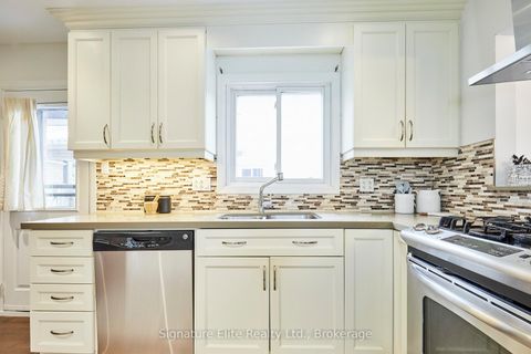 Photo 10 at 1 Wheeling Drive, Rouge E10, Toronto