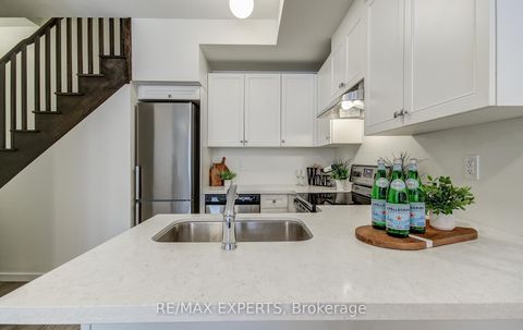 Photo 11 at 61 - 300 Alex Gardner Circle, Aurora Village, Aurora