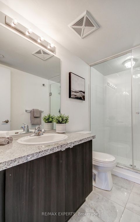 Photo 22 at 61 - 300 Alex Gardner Circle, Aurora Village, Aurora