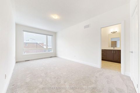 Photo 32 at 3 Vern Robertson Gate, Uxbridge