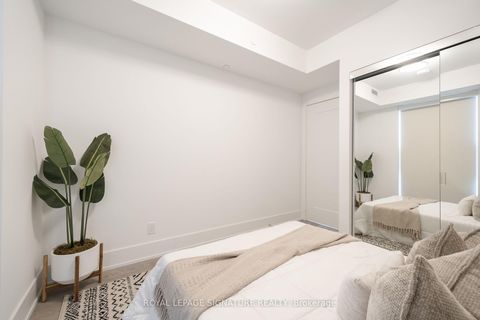 Photo 9 at 303 - 119 Denison Avenue, Chinatown, Toronto