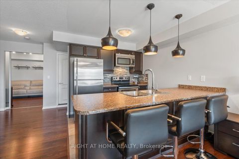 Photo 4 at 11 - 149 Isaac Devins Boulevard, Pelmo Park W5, Toronto