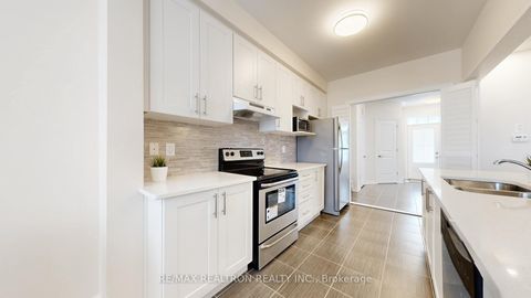 Photo 14 at 61 Lawrence Pilkington Avenue, Cornell, Markham