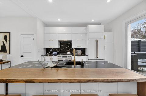 Photo 7 at 143 Parkmount Road, Coxwell, Toronto