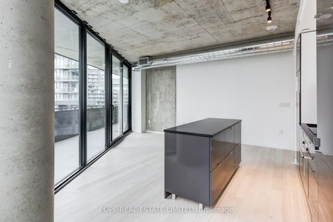 Photo 8 at 811 - 21 Lawren Harris Square, Moss Park, Toronto