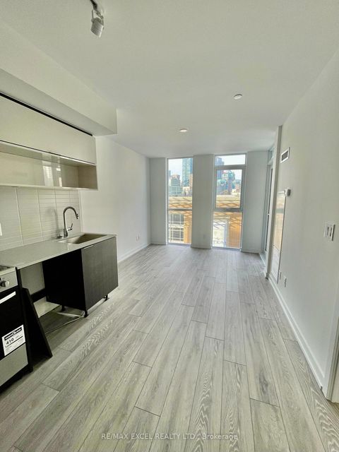 Photo 5 at 406 - 159 Wellesley Street E, South St. James Town, Toronto