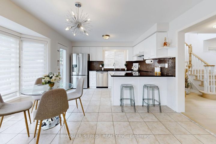 Photo 10 at 12 Castlemore Avenue, Berczy, Markham