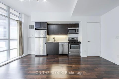 Photo 15 at 302 - 38 Joe Shuster Way, South Parkdale, Toronto