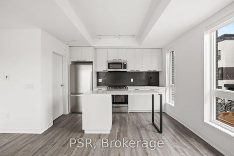 Photo 1 at TH13 - 40 Ed Clark Gardens Boulevard, Pellam Park, Toronto