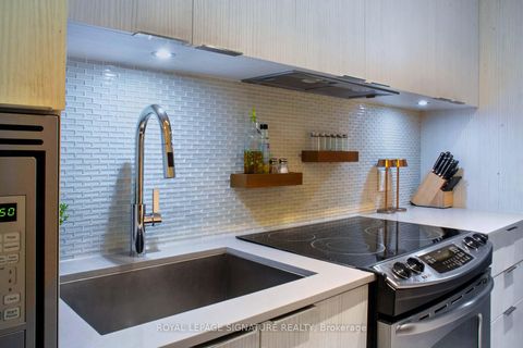 Photo 4 at 211 - 110 Marine Parade Drive, Mimico, Toronto