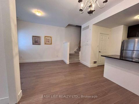 Photo 2 at 12 - 25 Coneflower Crescent, Branson, Toronto