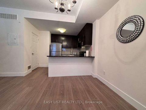 Photo 4 at 12 - 25 Coneflower Crescent, Branson, Toronto