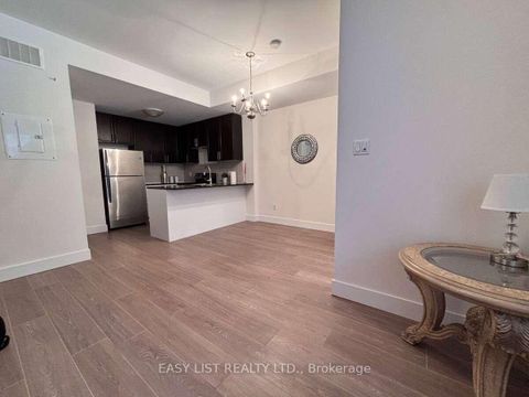 Photo 5 at 12 - 25 Coneflower Crescent, Branson, Toronto