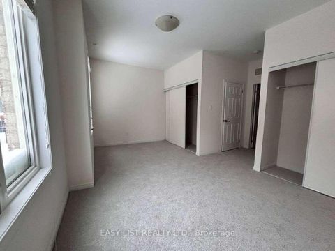 Photo 9 at 12 - 25 Coneflower Crescent, Branson, Toronto