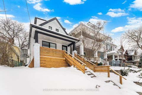 Photo 1 at 128 Duvernet Avenue, Danforth, Toronto