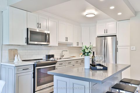 Photo 3 at 105 - 20 Edgecliff Golfway E, Flemingdon Park, Toronto