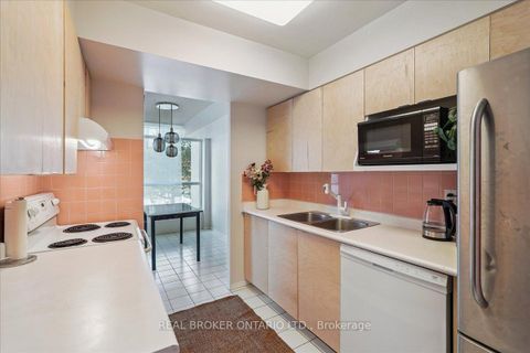 Photo 2 at 201 - 3233 Eglinton Avenue E, Scarborough Village, Toronto