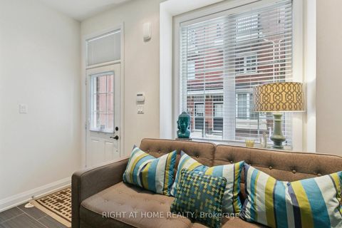 Photo 3 at 28 Raffeix Lane, Moss Park, Toronto