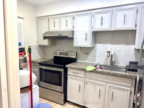 Photo 8 at 108 - 10 Eddystone Avenue, Jane Heights, Toronto