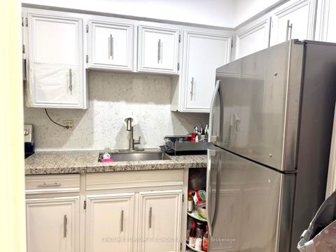 Photo 10 at 108 - 10 Eddystone Avenue, Jane Heights, Toronto