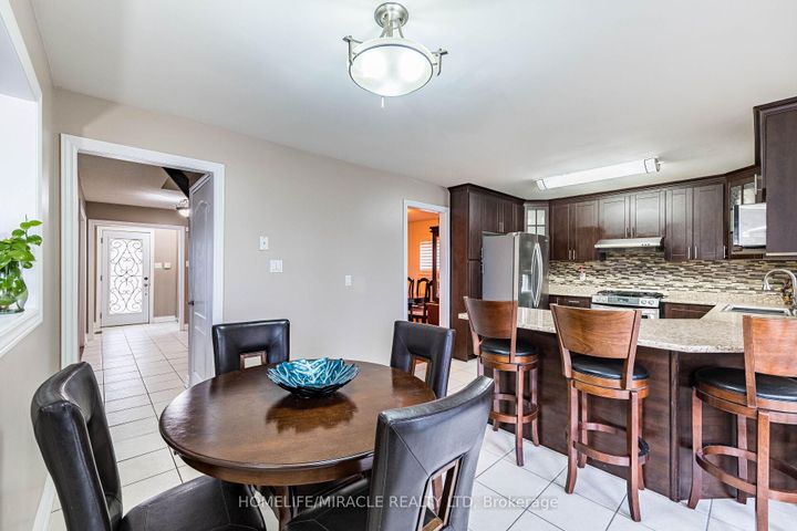 Photo 12 at 9 Ballycastle Crescent, Heart Lake West, Brampton