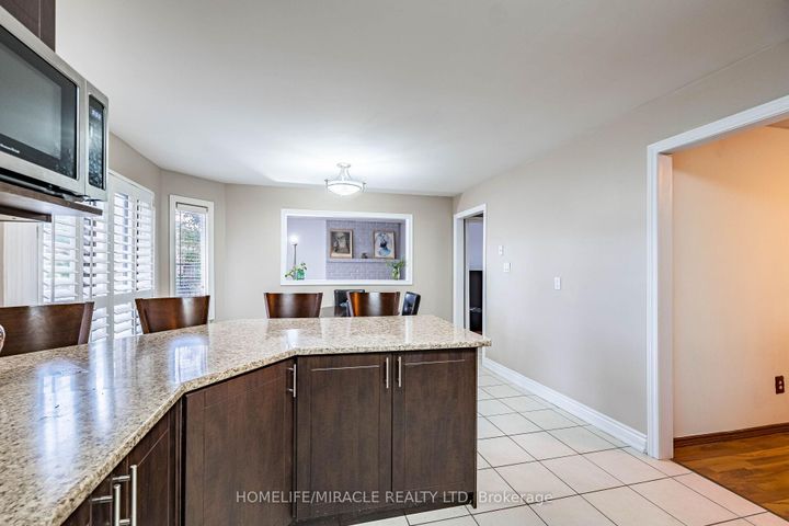 Photo 17 at 9 Ballycastle Crescent, Heart Lake West, Brampton