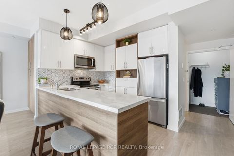 Photo 10 at 36 - 200 Alex Gardner Circle, Aurora Village, Aurora